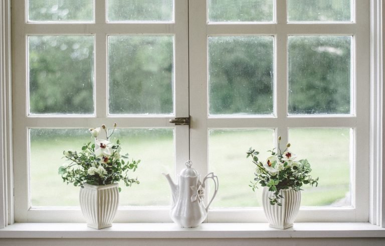 white window with vases