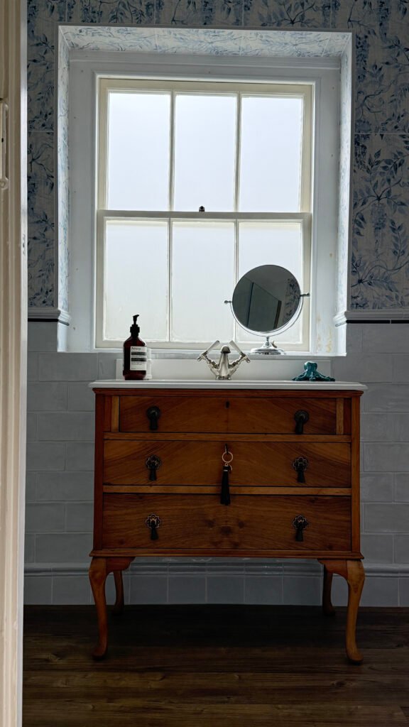 Restored sash window with privacy glass in period bathroom, Ampthill near Bedford